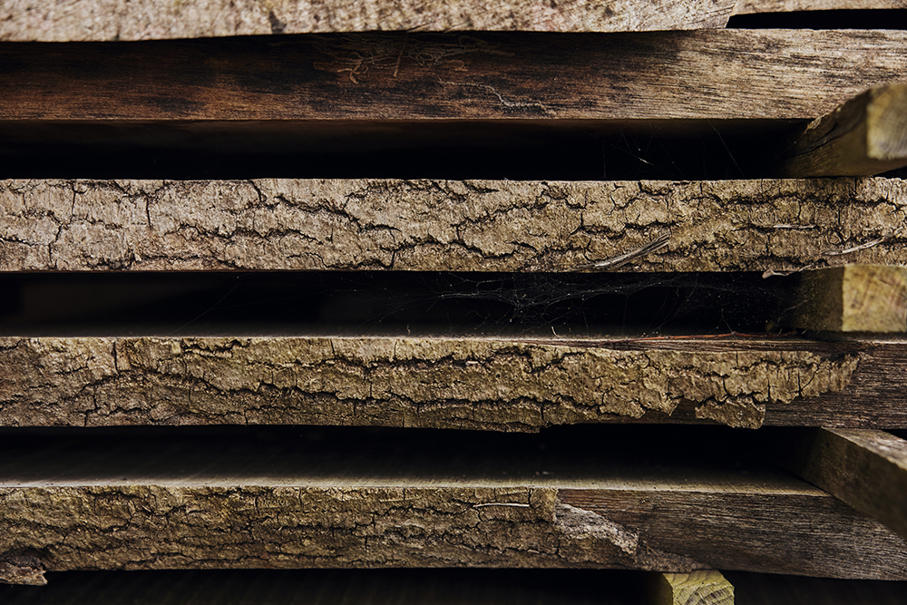 William Garvey slabs of Ash planted by our founder Bill Garvey waiting to dry before being cut and crafted into our boardroom table